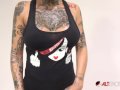 Interview with busty tattooed babe Genevieve Sinn